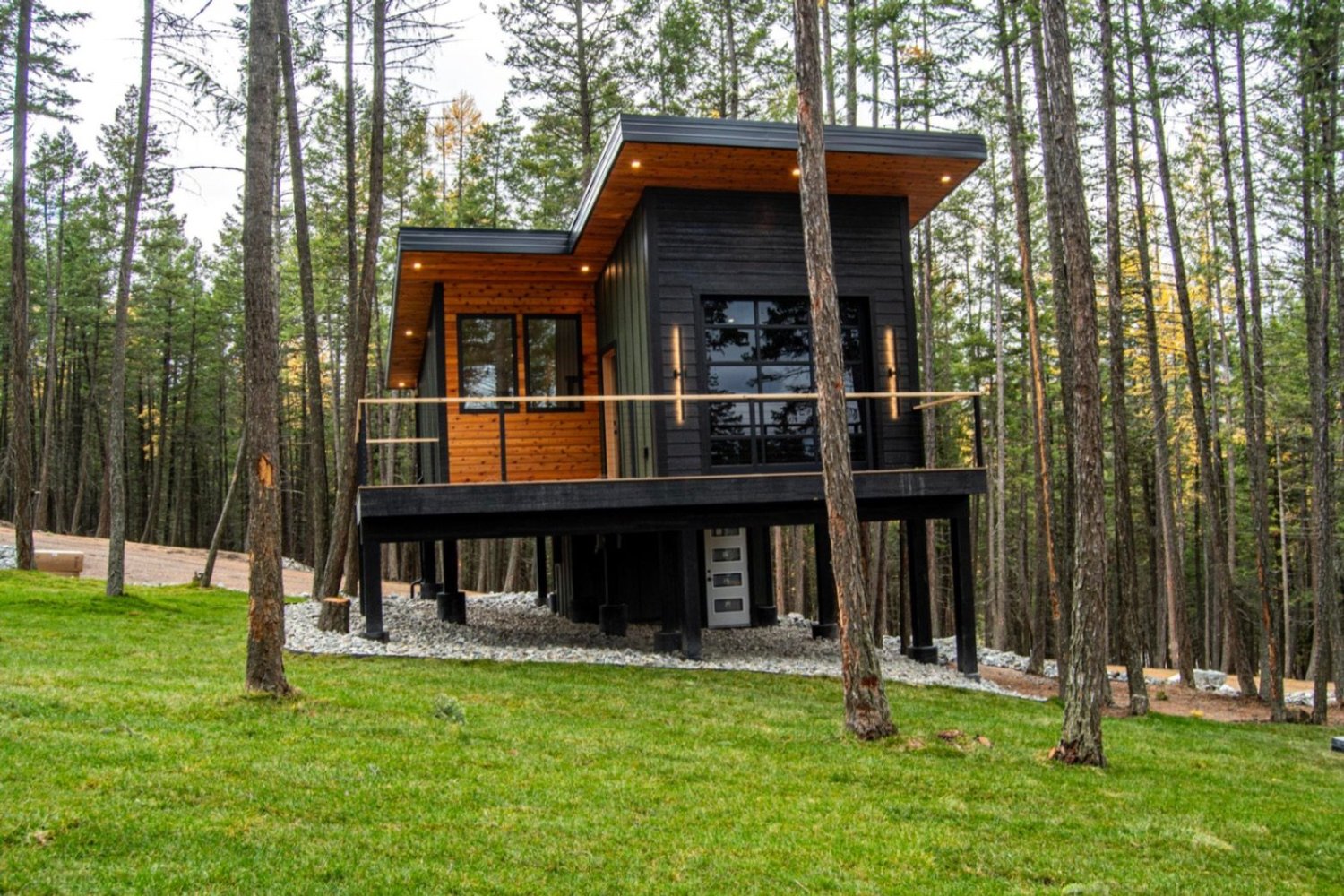 The Summit exterior in black and wood siding with large glass windows